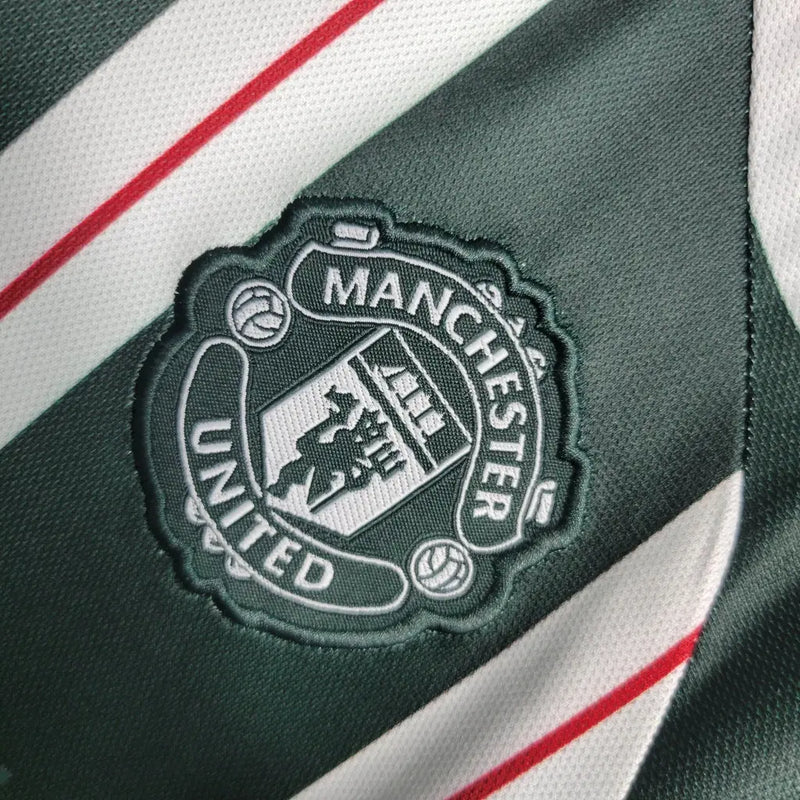 KIT Infantil Manchester United 2023/24 Fora